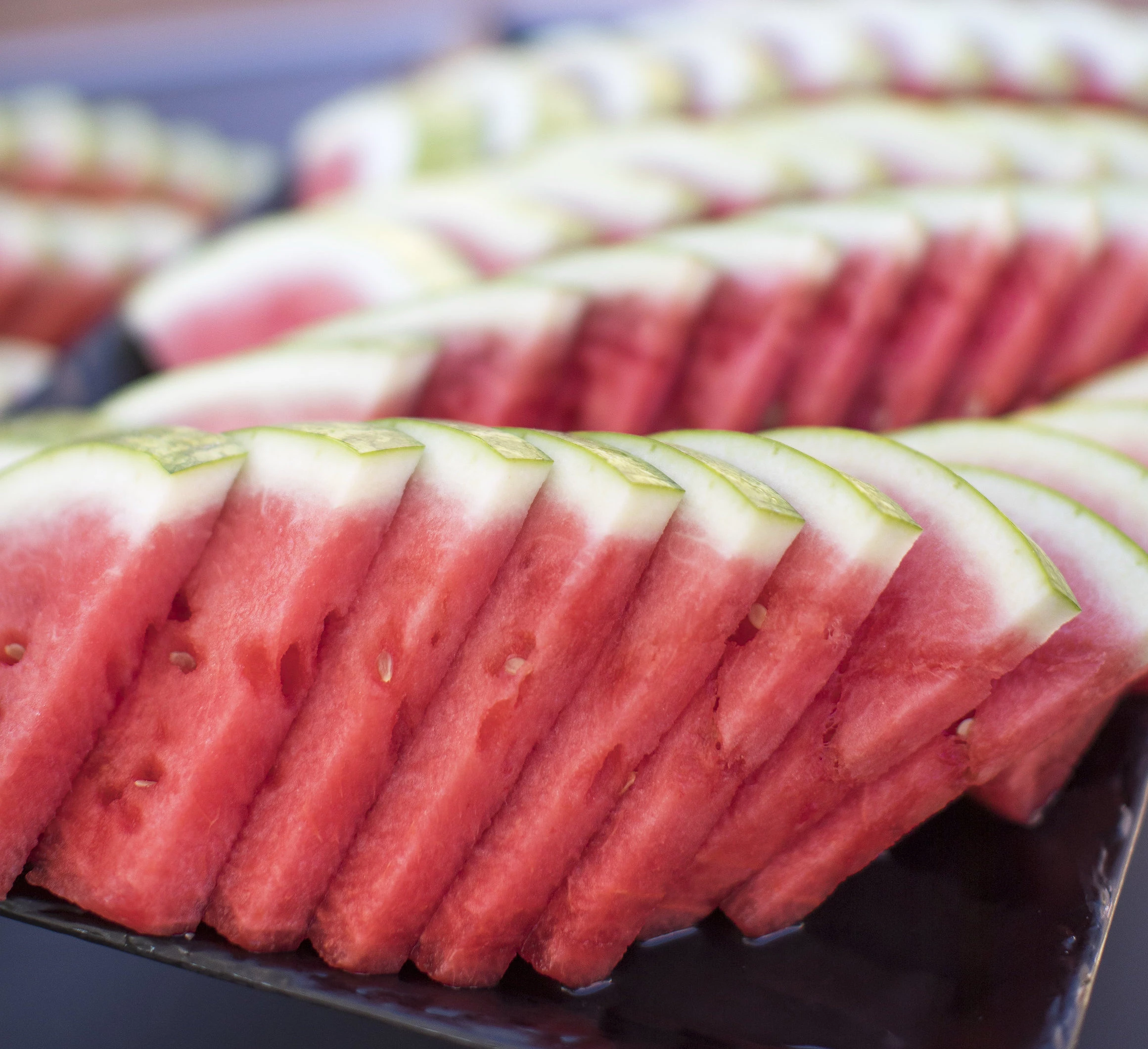 a plate of watermelon slices