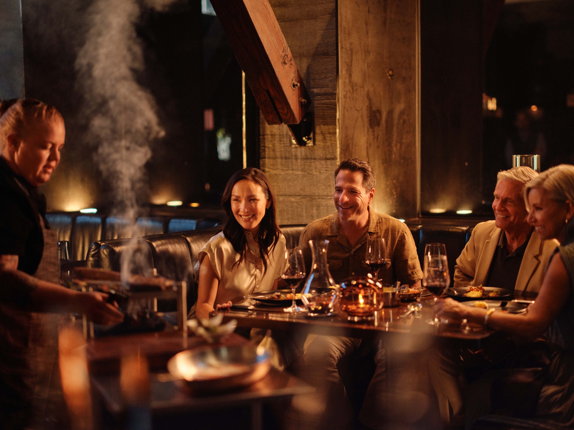 a group of people sitting at a table