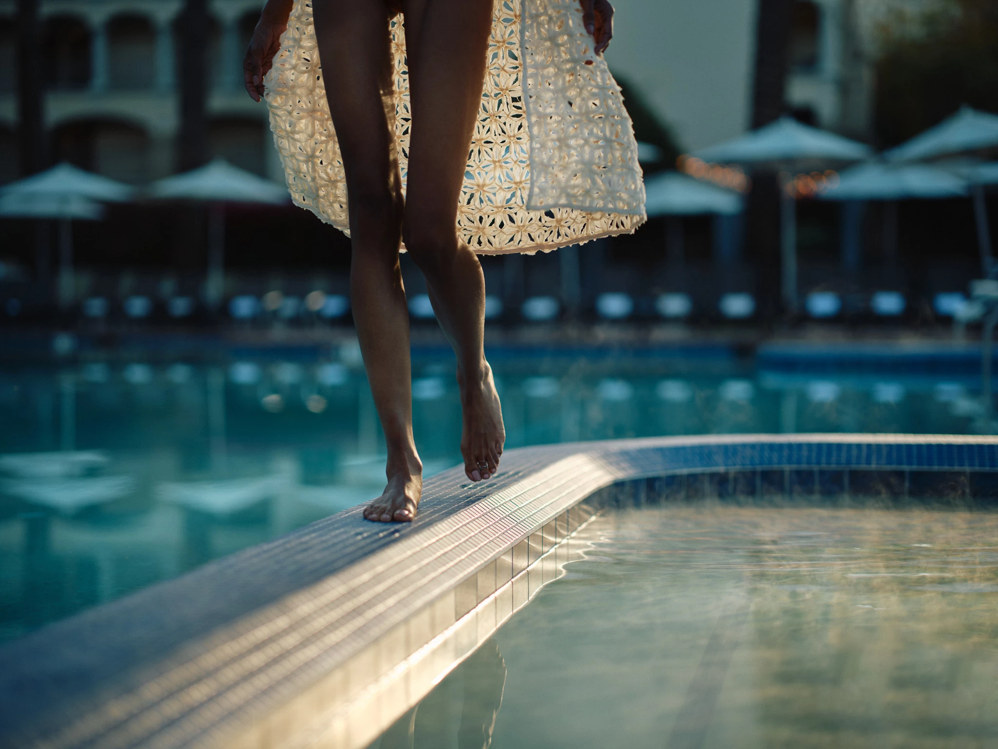 a woman standing on a dock