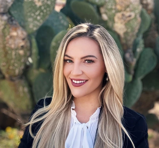 a woman smiling at camera