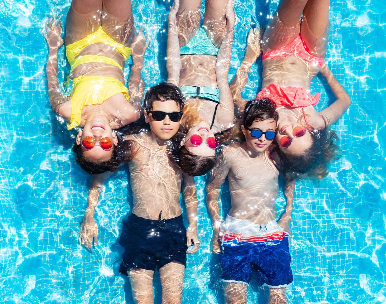 a group of kids in a pool