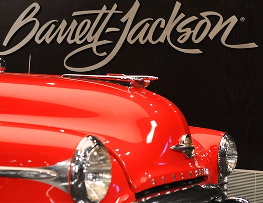 a close up of a red car