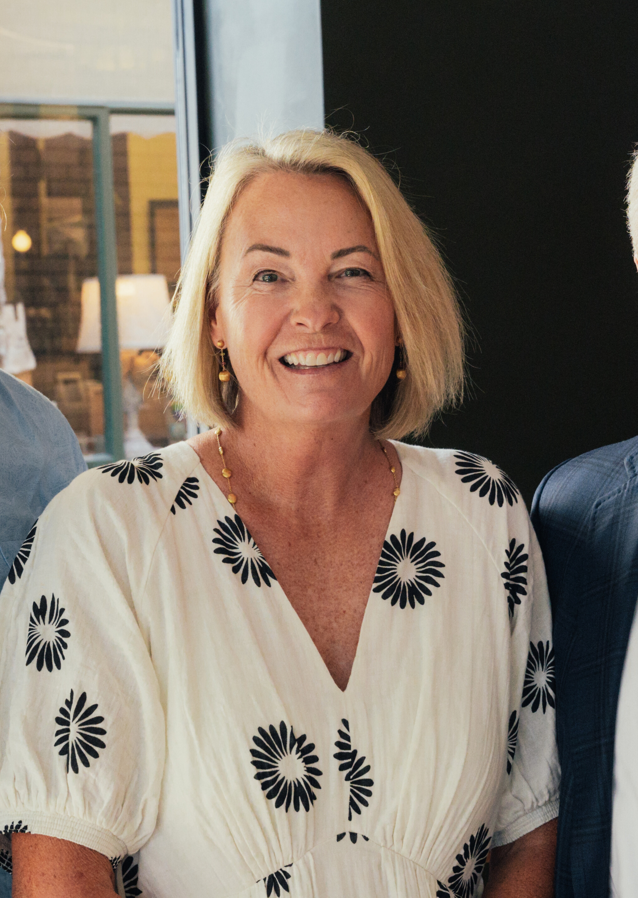 a woman smiling at camera