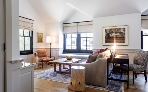 Sitting and writing desk areas of an Epiphany Junior Suite at Fess Parker Wine Country Inn