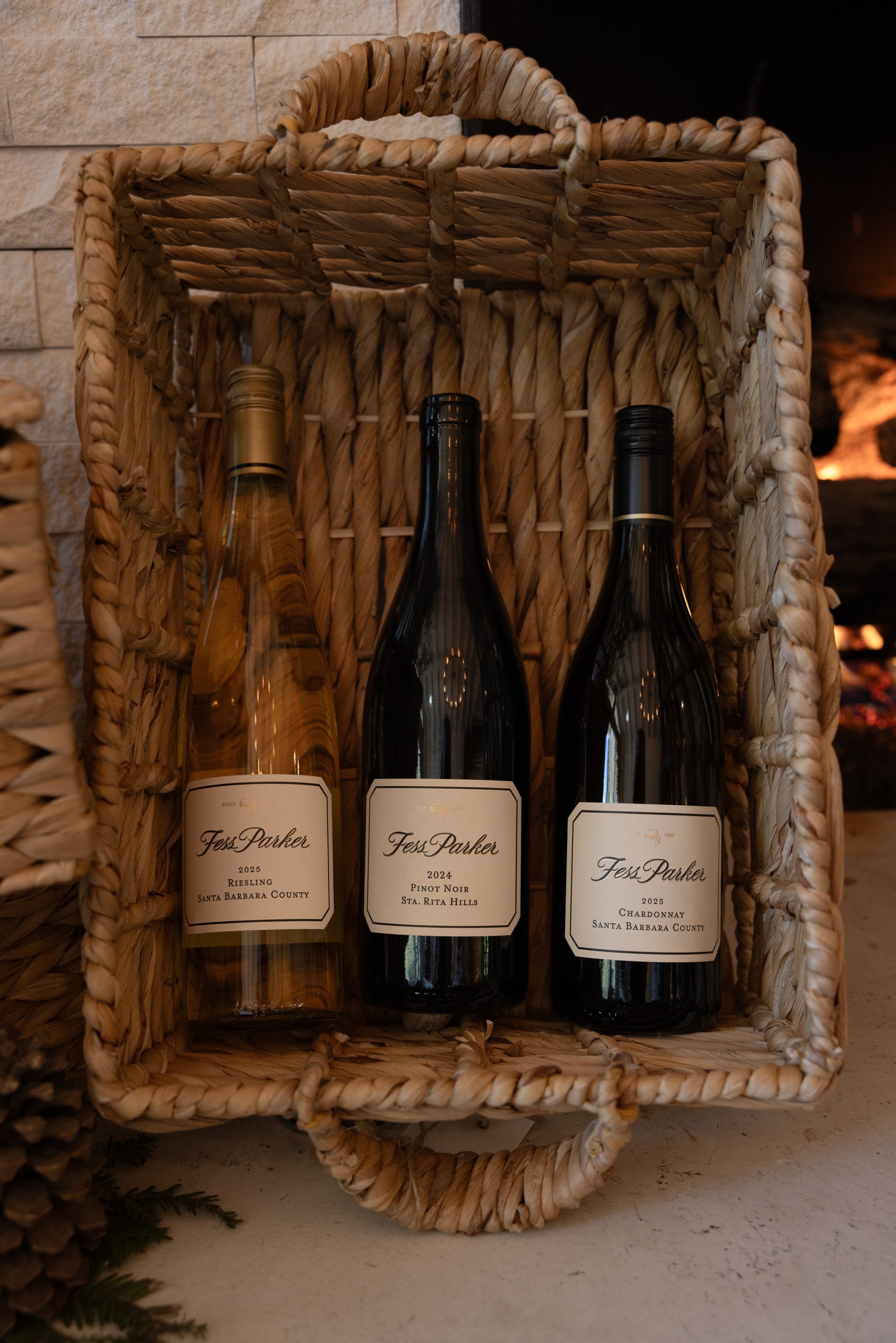 a basket with bottles of wine