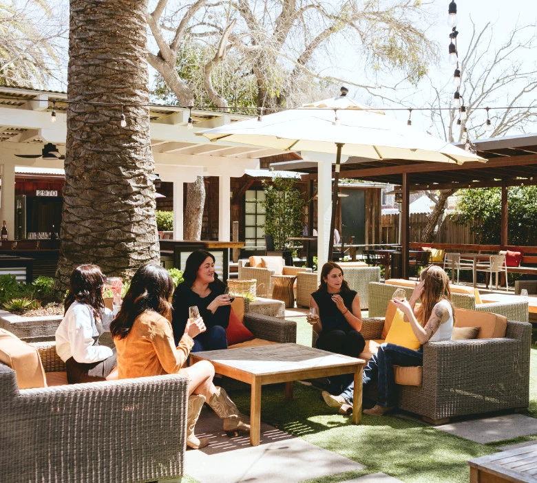 Guests enjoying an Epiphany tasting experience in the garden