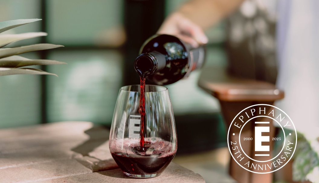 Pouring a glass of Epiphany red wine