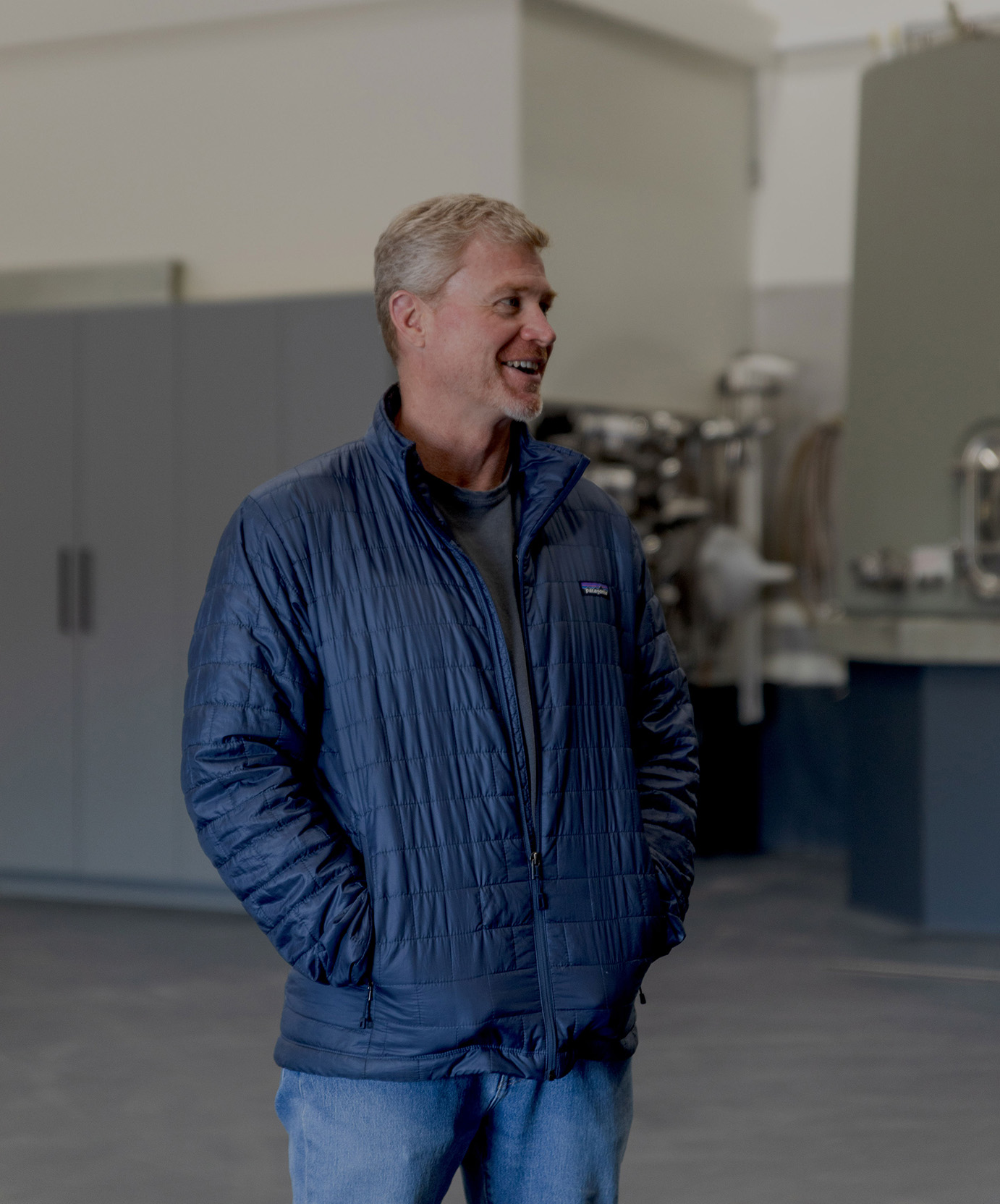 a man in a blue jacket