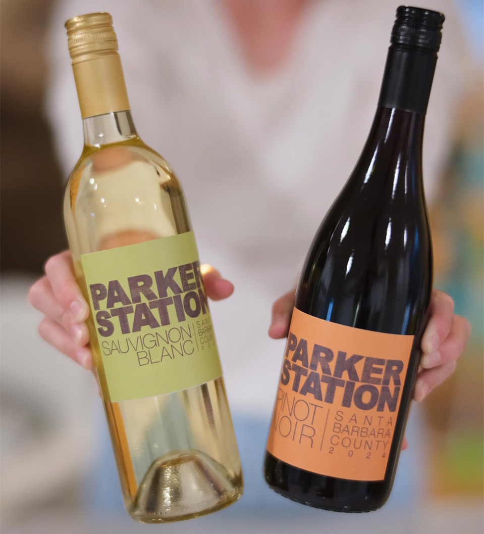 a person holding a bottle of wine