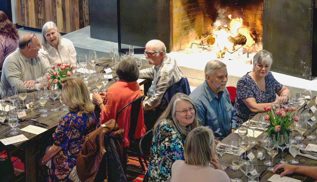 Guests enjoying the Fireside Dinner at Fess Parker Winery