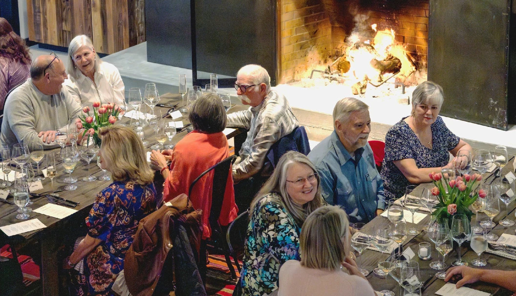 Guests enjoying the Fireside Dinner at Fess Parker Winery