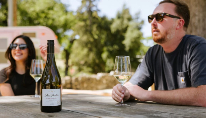 Spencer and Ashley enjoying some Fess Parker Rodney's Vineyard Viognier in the Parker Family Oak Grove