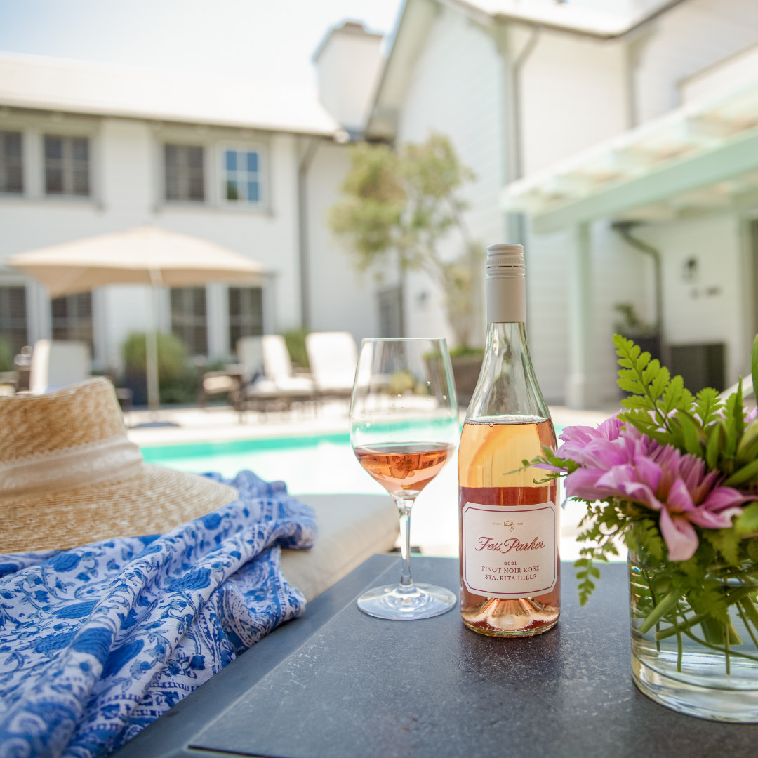 Poolside with a bottle of Fess Parker Pinot Noir Rose at Fess Parker Wine Country Inn in Los Olivos, CA
