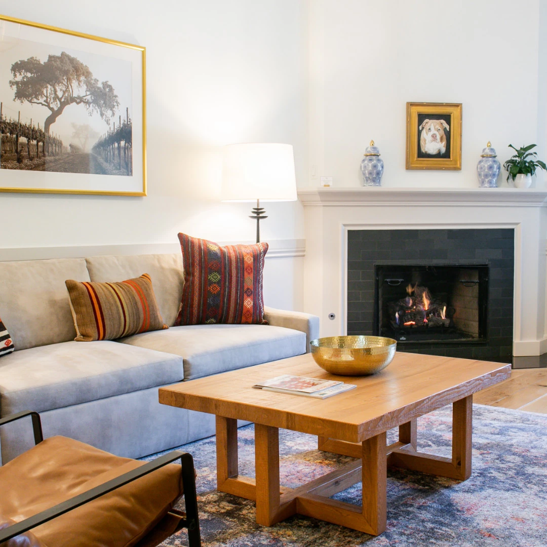 Living room with fireplace of the Boone Suite at Fess Parker Wine Country Inn in Los Olivos, CA