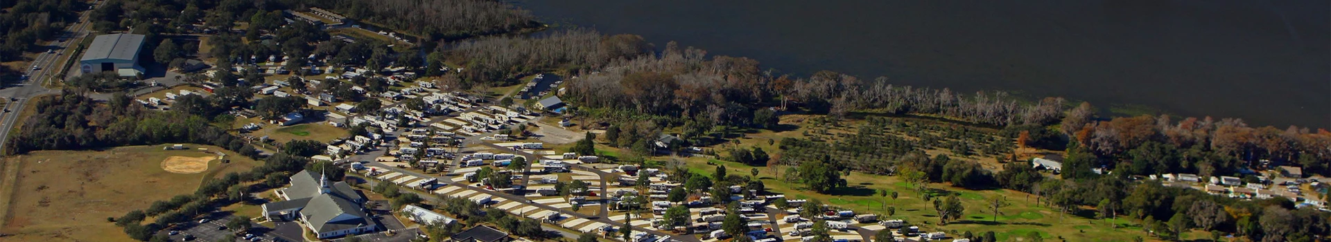 aerial view of a park with many rvs