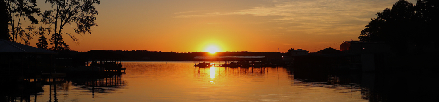 a sunset over a lake