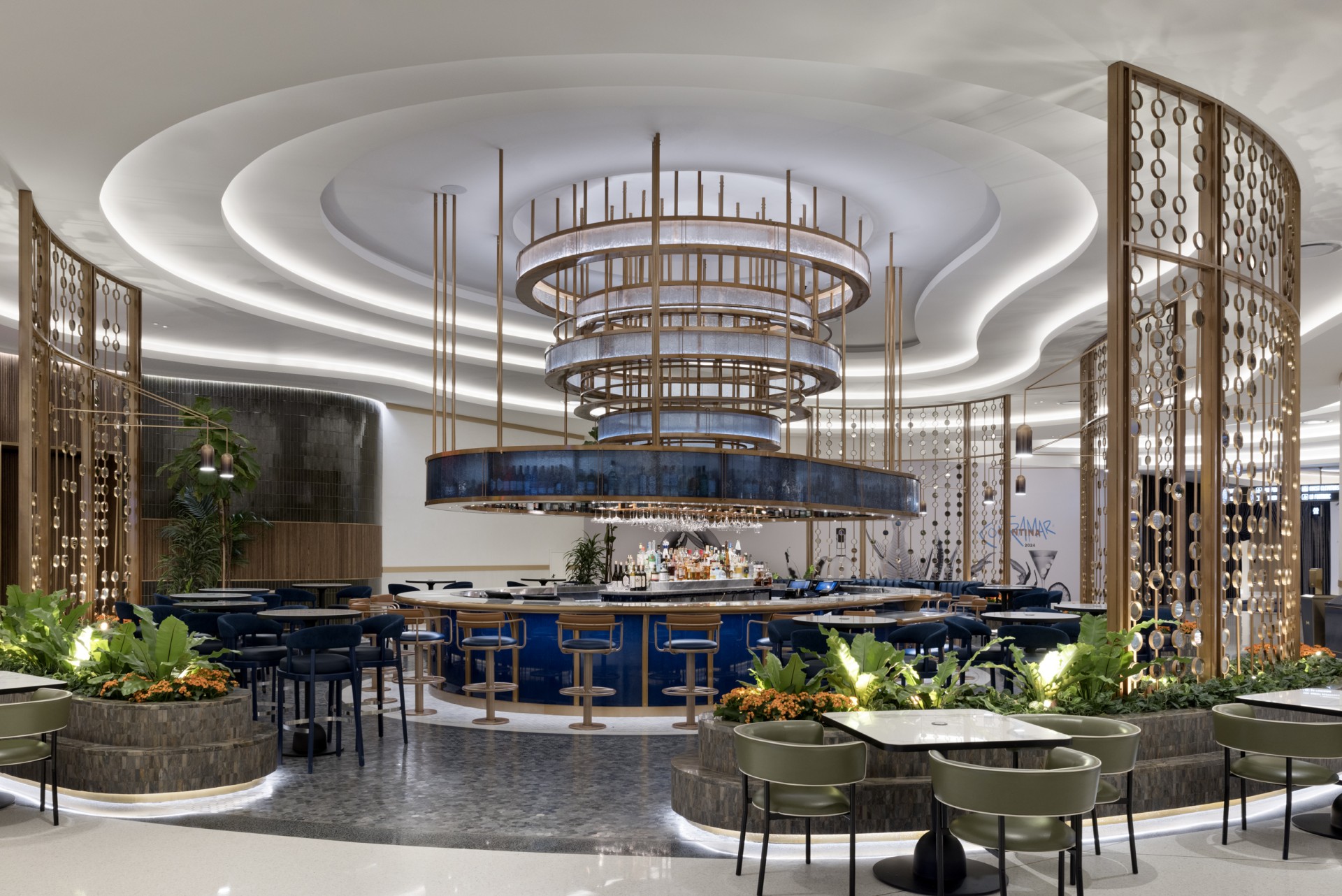 a restaurant with a circular chandelier