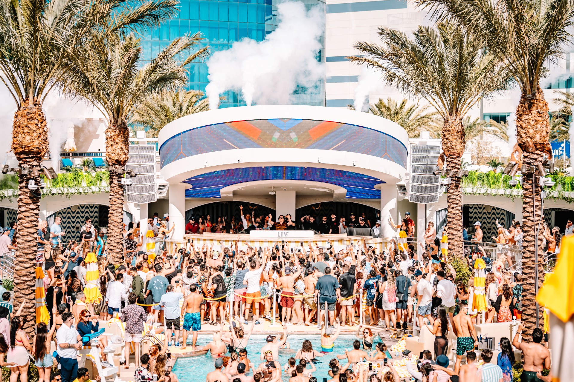 a group of people at a pool