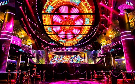 a stage with lights and a circular design