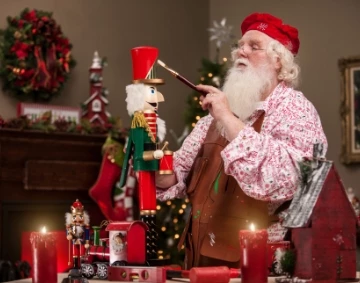 a man painting a nutcracker