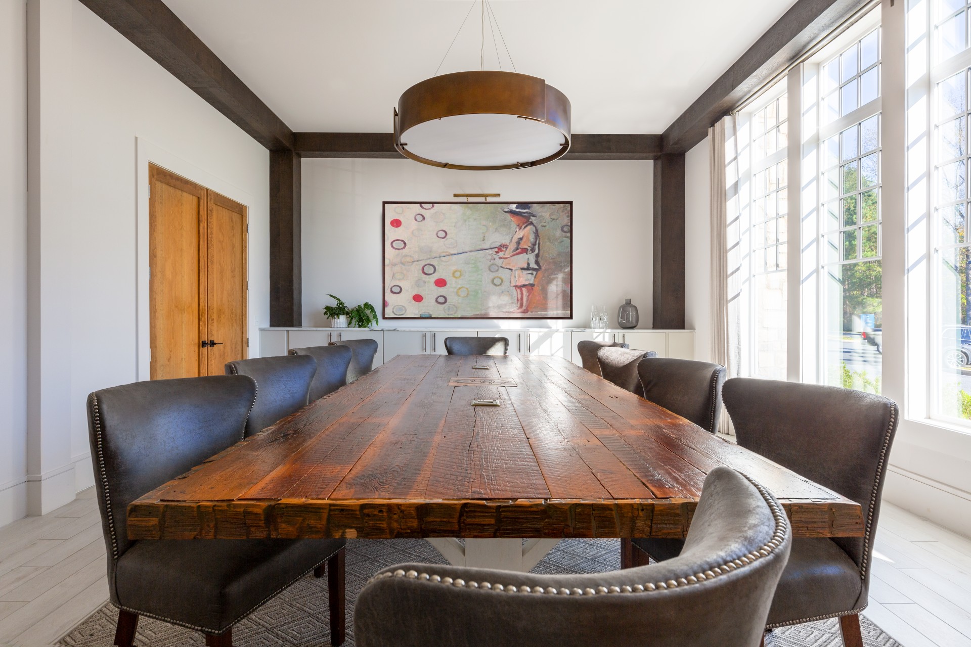 a room with a table and chairs