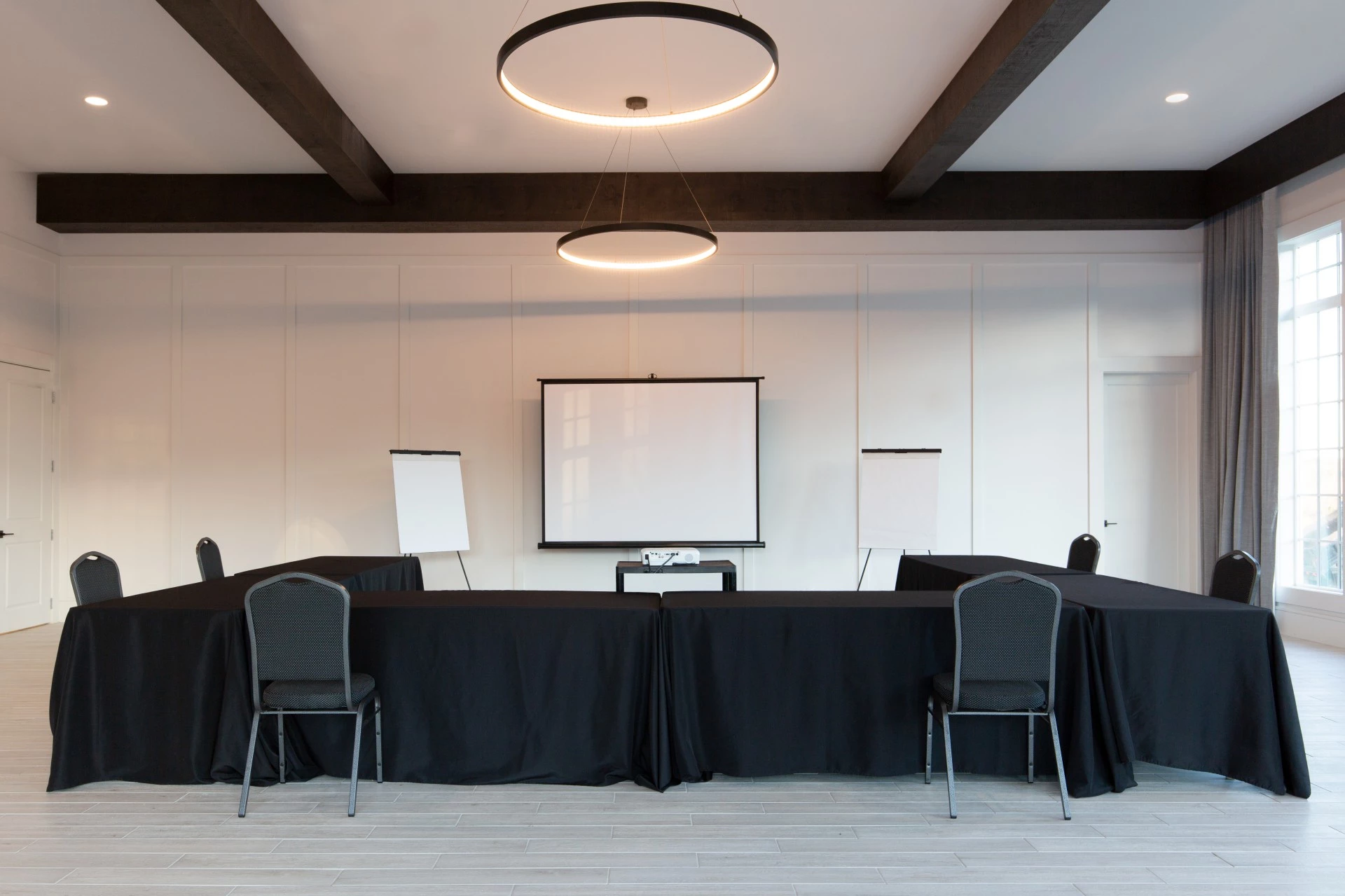 a room with a table and chairs