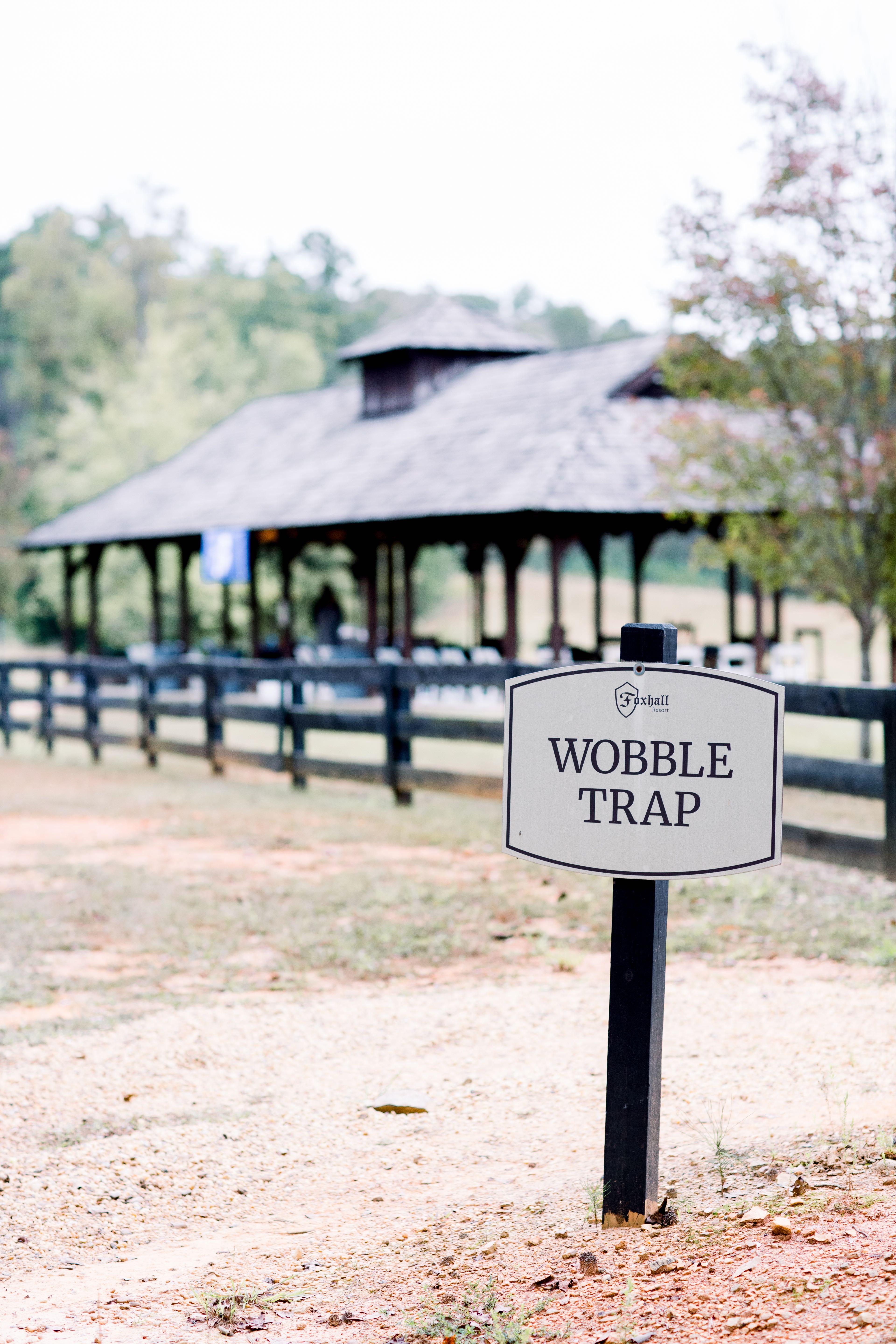 a sign in front of a building