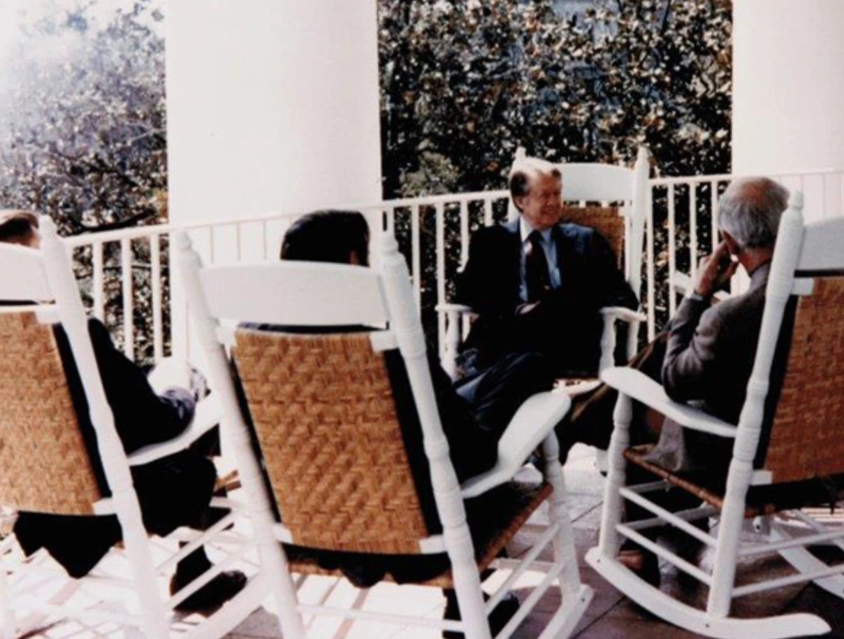 a group of people sitting in chairs