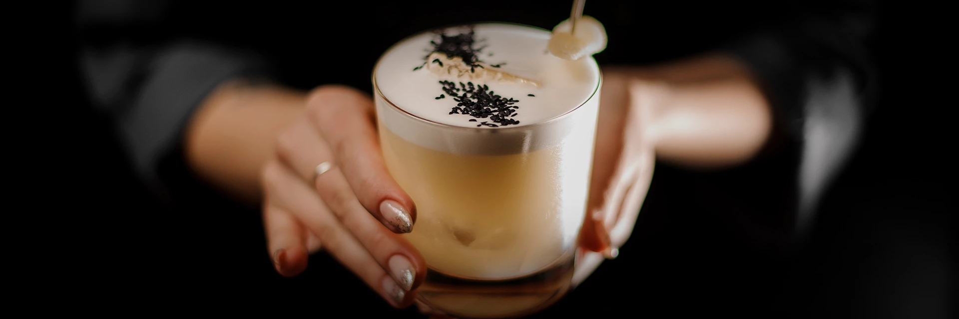 a person holding a cup of coffee