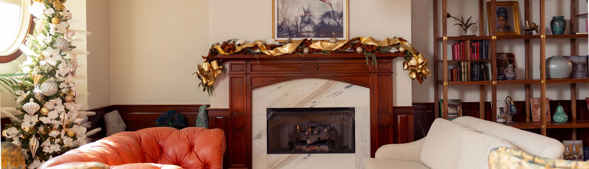 a fireplace with a picture on the wall