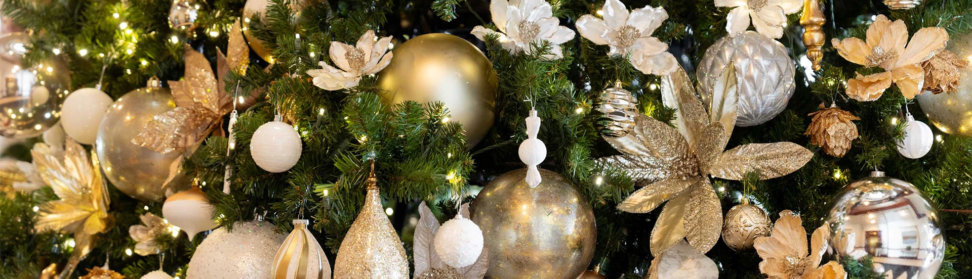 a close up of ornaments on a tree