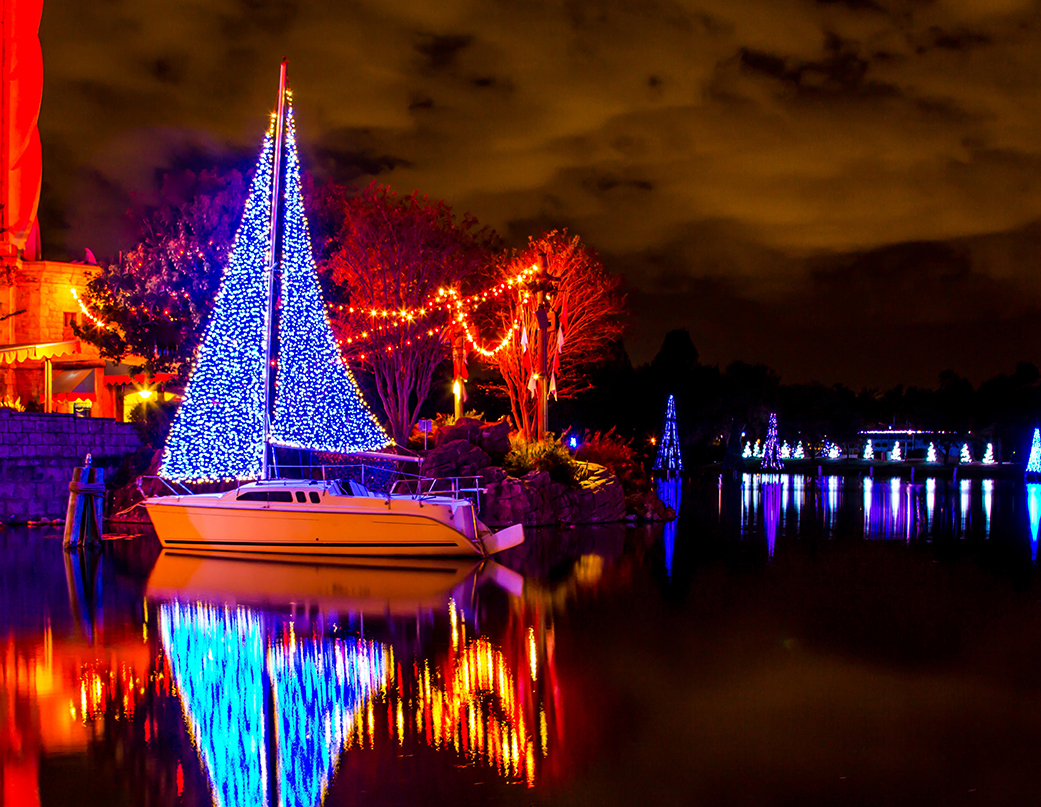 a boat with a christmas tree on it