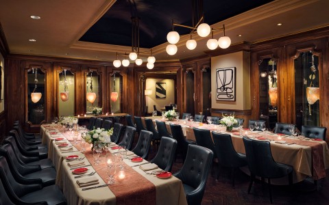 a room with tables and chairs