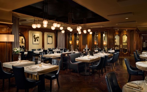 a room with tables and chairs