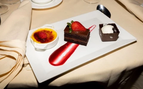 a plate of desserts on a table