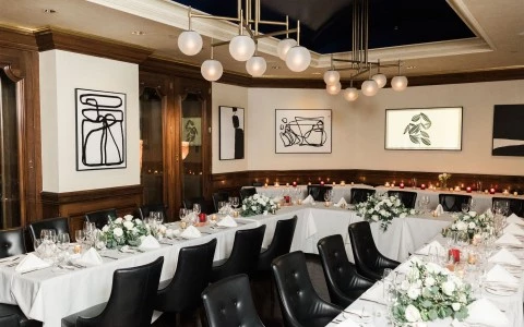 a room with tables and chairs