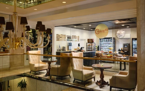 a room with glass walls and a glass railing