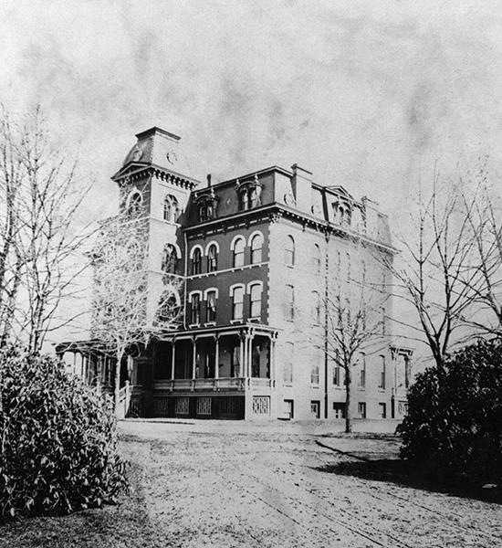 black and white image of old hotel building