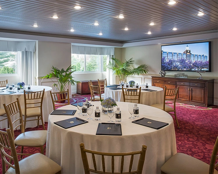 a room with tables and chairs