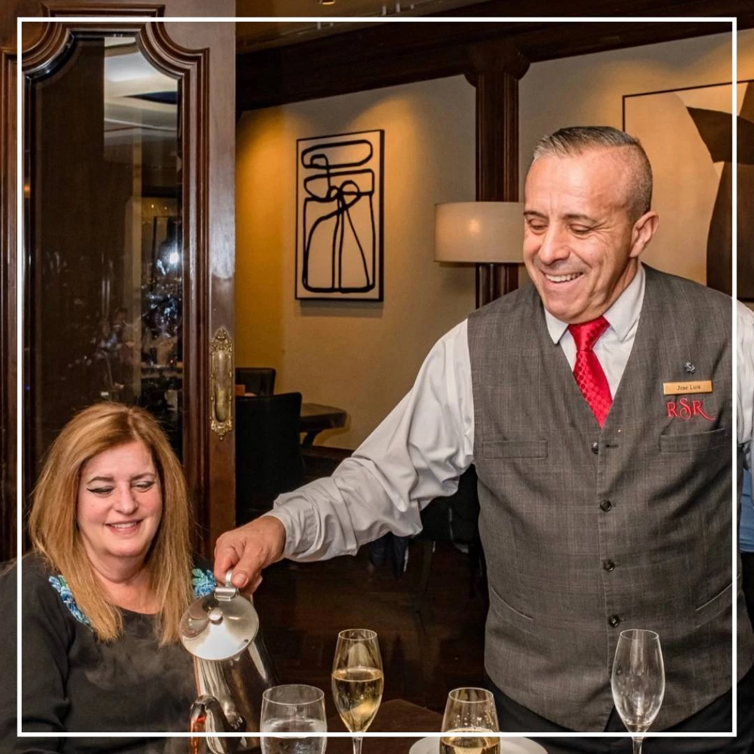 a man serving a woman