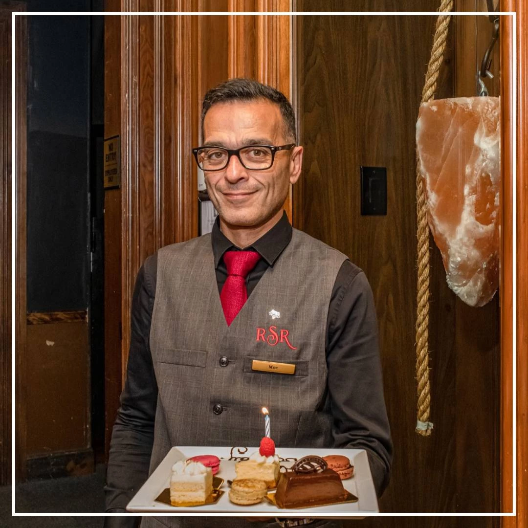 a man holding a plate of food
