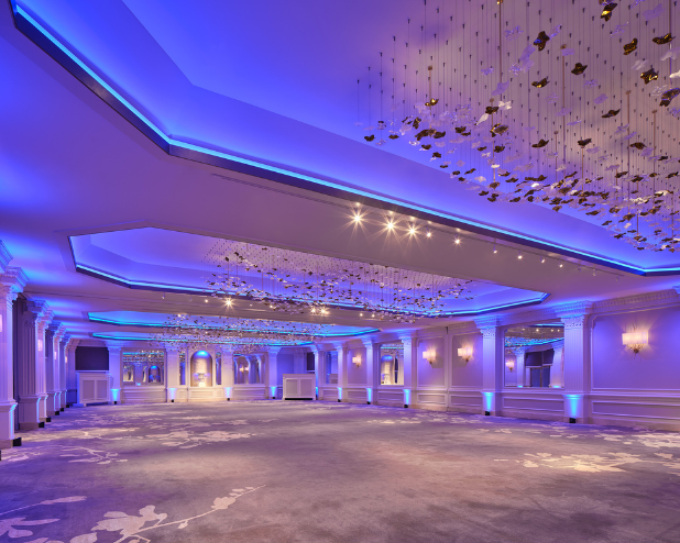 a large room with blue lights