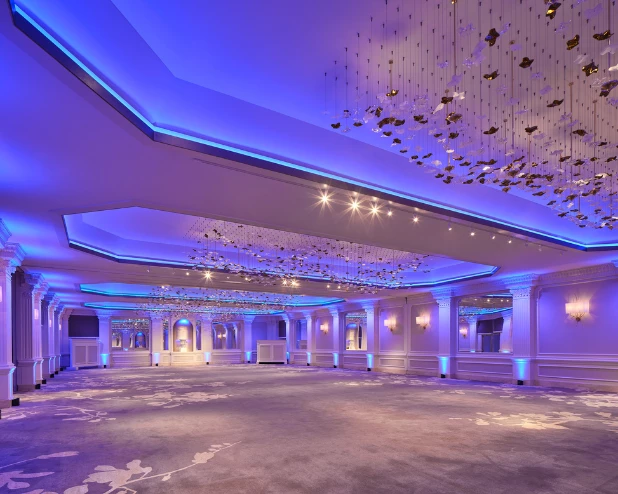 a large room with blue lights