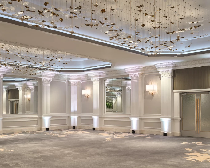a room with columns and lights