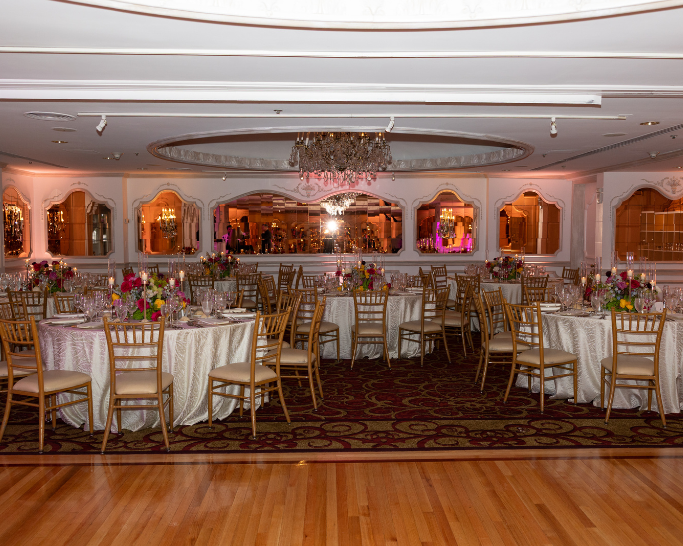 a room with tables and chairs
