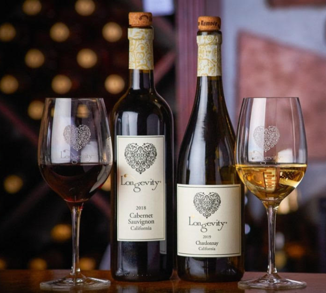 a group of wine bottles and glasses