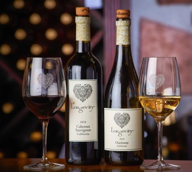 a group of wine bottles and glasses