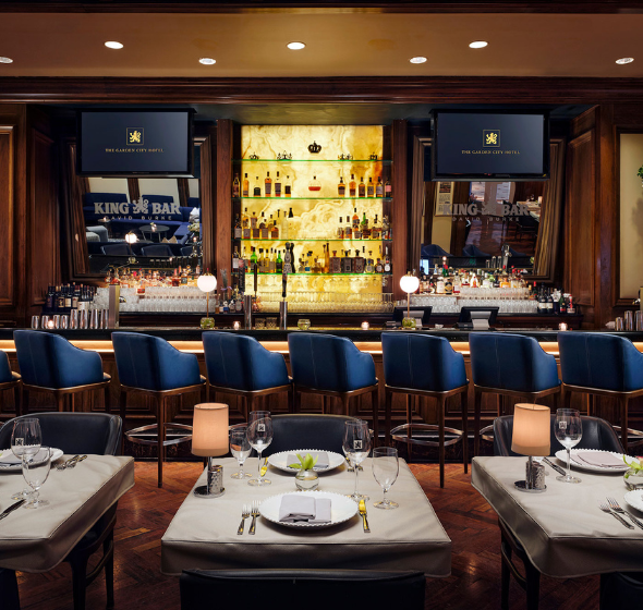 a restaurant with tables and chairs