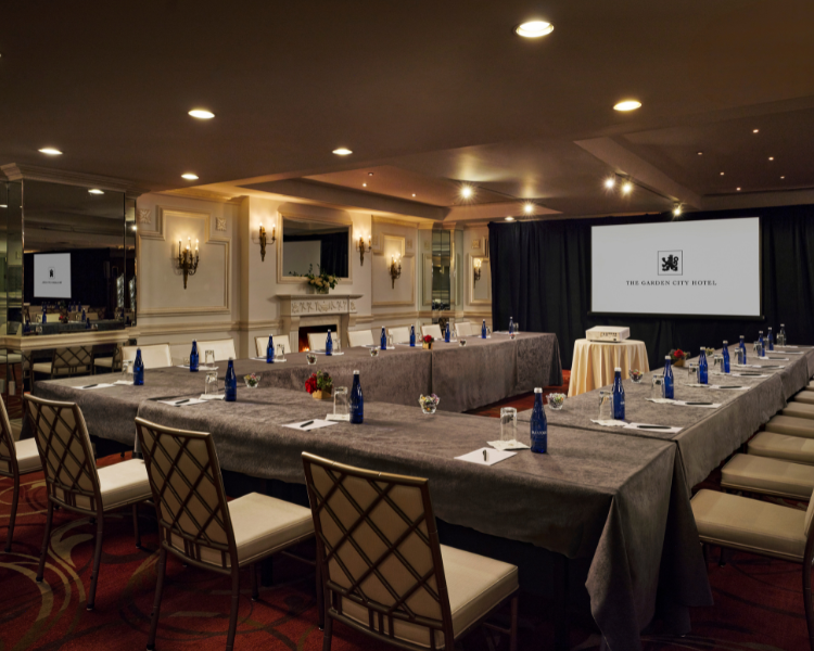 a large room with tables and chairs