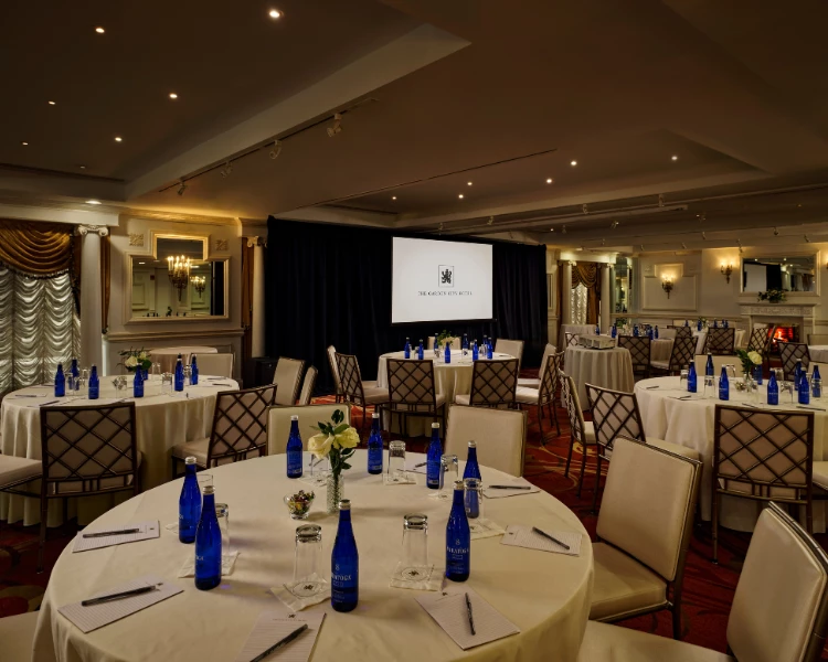 a room with tables and chairs